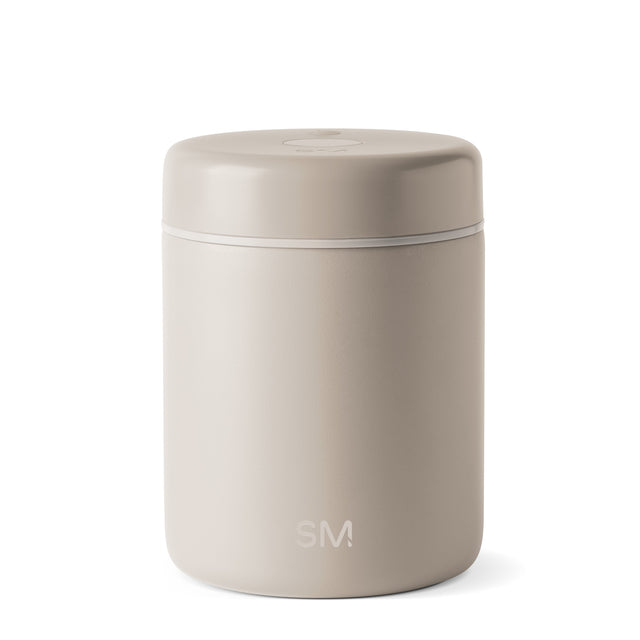 Beige cream-colored container with light gray horizontal accent line at mid-section where lid meets base, minimalist design with soft neutral tones Beige cream-colored container with light gray horizontal accent line at mid-section where lid meets base, minimalist design with soft neutral tones