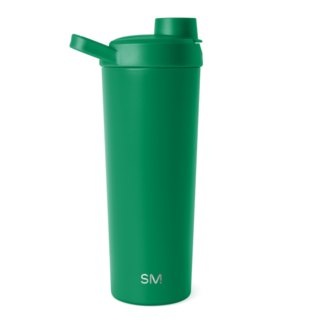 Bright green bottle with matching lid on white background Bright green bottle with matching lid on white background
