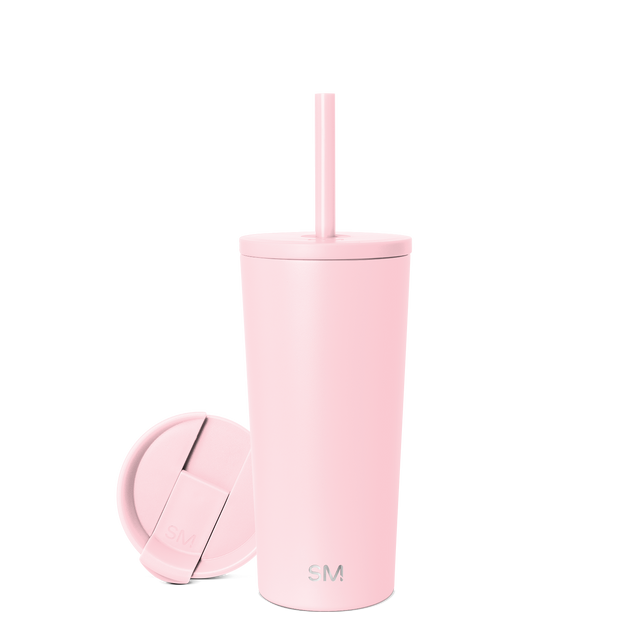 Pale pink cylindrical vessel with matching circular lid on neutral background Pale pink cylindrical vessel with matching circular lid on neutral background
