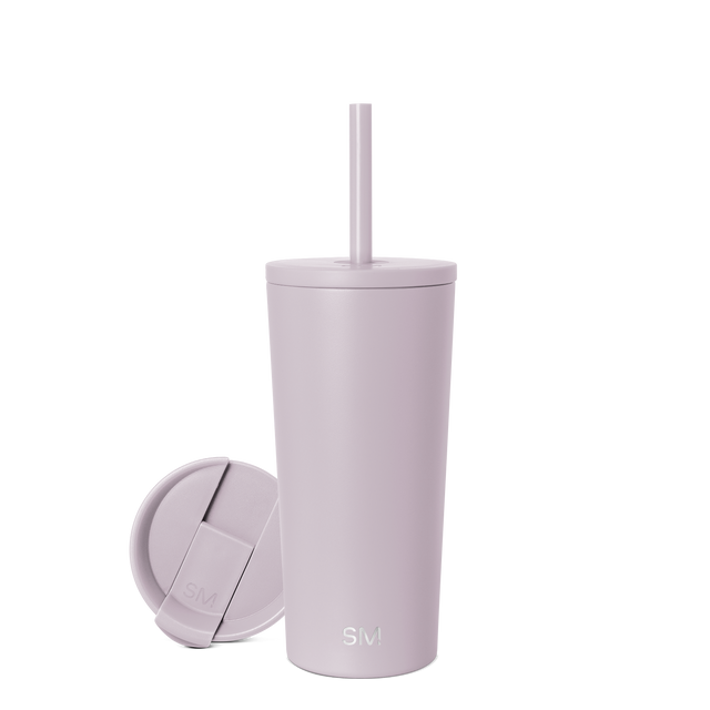 Pale purple-gray drinkware with matching lid and straw on white background Pale purple-gray drinkware with matching lid and straw on white background