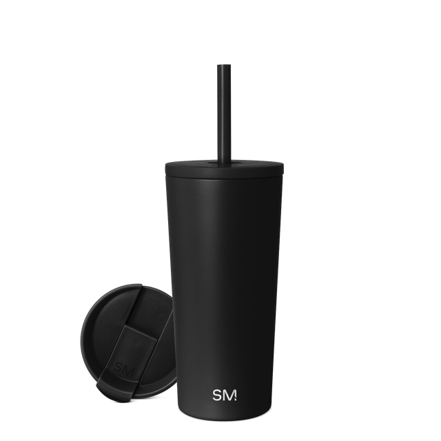 Matte black stainless steel tumbler with white text on clean white background Matte black stainless steel tumbler with white text on clean white background