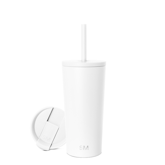White insulated tumbler with matching white lid and reusable straw, featuring subtle gray shadows on clean white background White insulated tumbler with matching white lid and reusable straw, featuring subtle gray shadows on clean white background