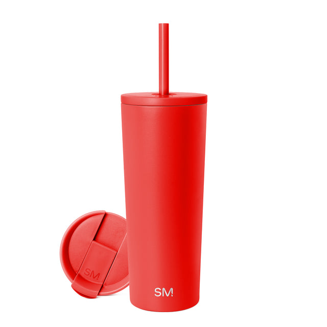 Red-orange ceramic drinkware on white background Red-orange ceramic drinkware on white background