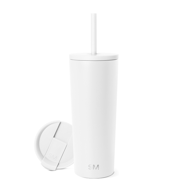 White insulated tumbler with matching white lid and straw on light gray background White insulated tumbler with matching white lid and straw on light gray background