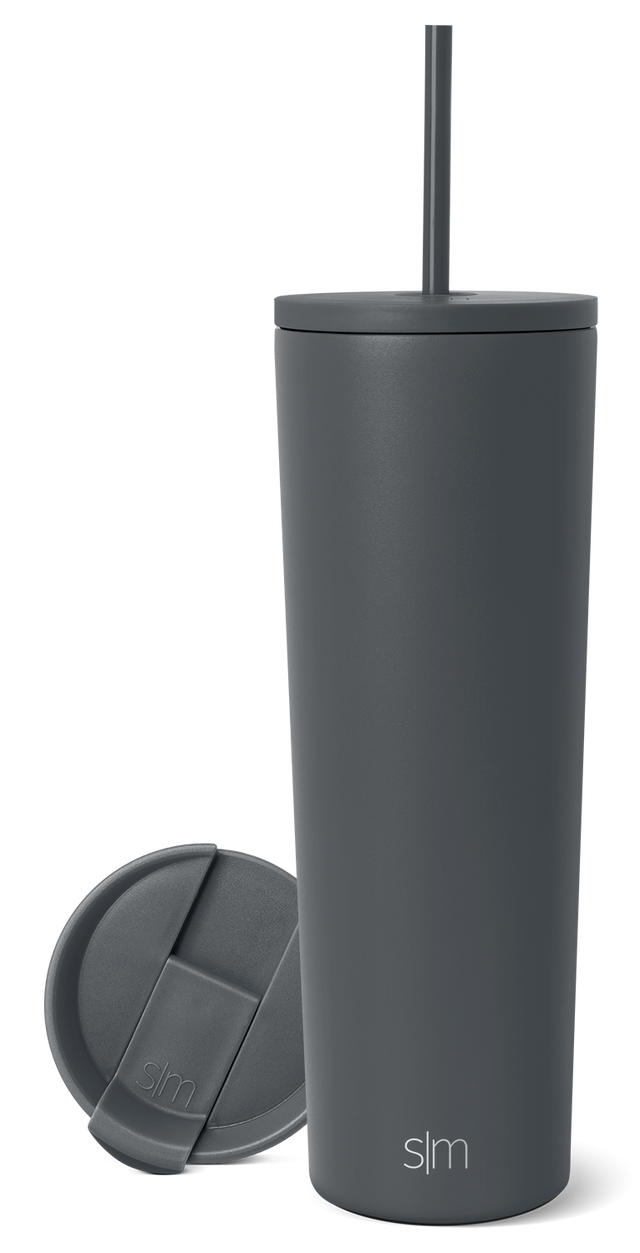 Classic gray-charcoal tumbler with fitted lid and matching straw, shown against white background. Separate circular lid displayed to left. Simple Modern logo debossed on lid and lower body. Classic gray-charcoal tumbler with fitted lid and matching straw, shown against white background. Separate circular lid displayed to left. Simple Modern logo debossed on lid and lower body.
