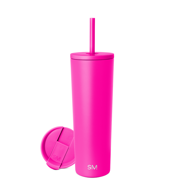 Hot pink insulated tumbler with matching lid on white background Hot pink insulated tumbler with matching lid on white background