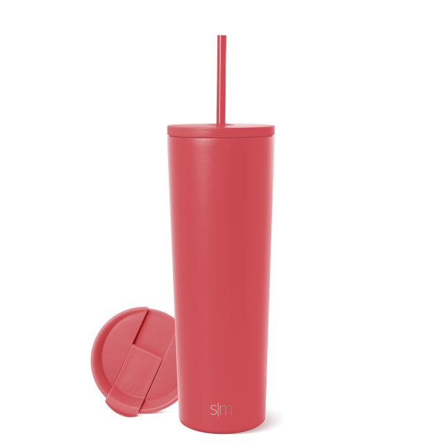 Coral-pink tumbler with matching detached lid displayed on clean background Coral-pink tumbler with matching detached lid displayed on clean background