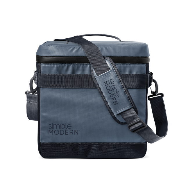 Slate blue-gray crossbody bag with black webbing strap and black accent details, modern neutral design Slate blue-gray crossbody bag with black webbing strap and black accent details, modern neutral design