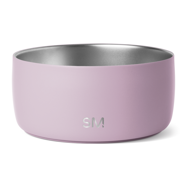 Lavender pink mixing bowl with brushed stainless steel interior, shown from angled view to display contrasting exterior and metallic finish inside. Lavender pink mixing bowl with brushed stainless steel interior, shown from angled view to display contrasting exterior and metallic finish inside.