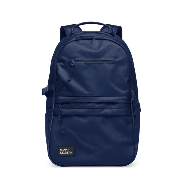 Navy blue backpack on white background Navy blue backpack on white background