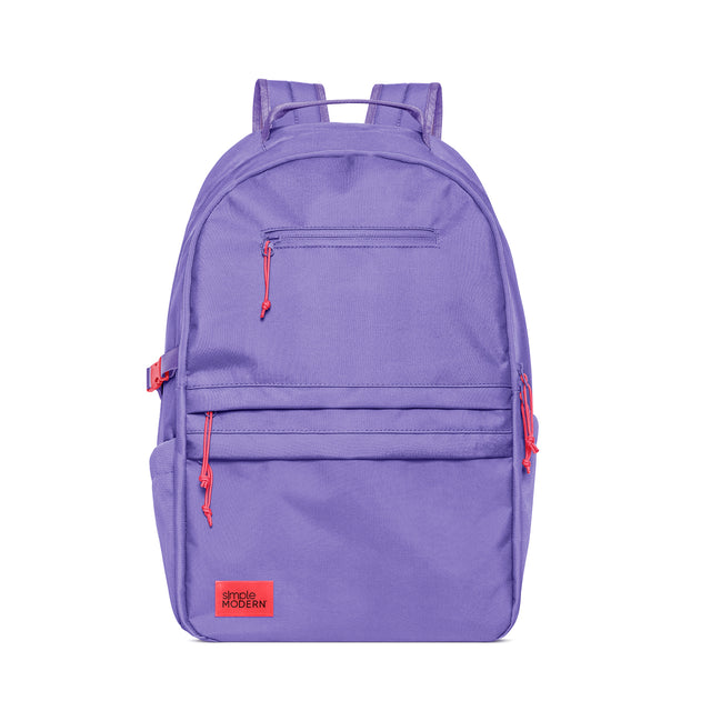 Purple backpack with coral-red and hot pink accents on zipper pulls, side handles, and brand label Purple backpack with coral-red and hot pink accents on zipper pulls, side handles, and brand label