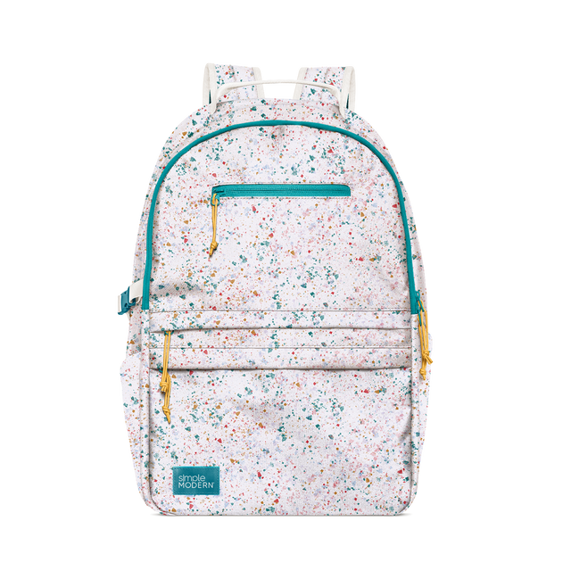 Light pink speckled backpack with teal, turquoise, coral, gold, orange, navy blue, and multicolored flecks scattered throughout the design. Light pink speckled backpack with teal, turquoise, coral, gold, orange, navy blue, and multicolored flecks scattered throughout the design.