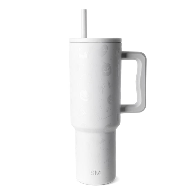 White stainless steel tumbler with matching white straw on light gray background White stainless steel tumbler with matching white straw on light gray background