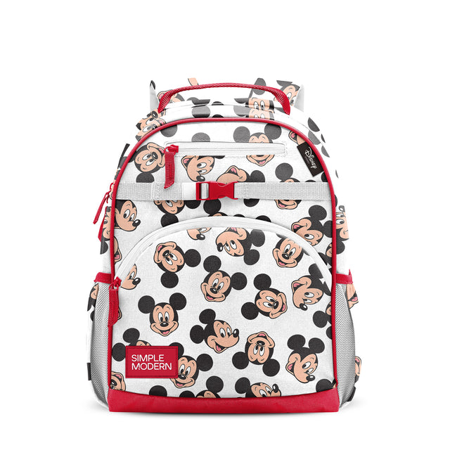 White children's backpack with Mickey Mouse print, red trim, handles, and zippered pockets. Features Mickey faces and ears throughout, padded straps, top carry handle, and gray mesh side pockets. Simple Modern branded. White children's backpack with Mickey Mouse print, red trim, handles, and zippered pockets. Features Mickey faces and ears throughout, padded straps, top carry handle, and gray mesh side pockets. Simple Modern branded.