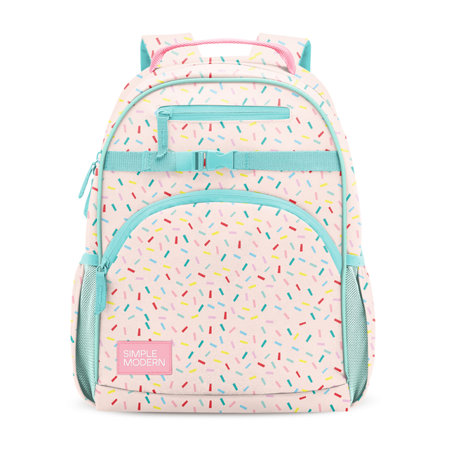 Soft pale pink backpack with bright turquoise and mint green accent trim on structural elements Soft pale pink backpack with bright turquoise and mint green accent trim on structural elements