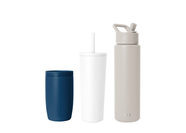 Three drinkware products on white background: white mug on left, beige taupe mug in center, navy blue mug on right Three drinkware products on white background: white mug on left, beige taupe mug in center, navy blue mug on right
