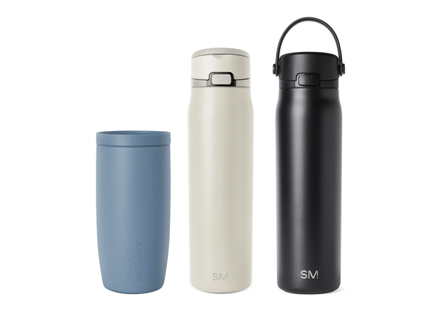 Three insulated tumblers in slate blue, white, and gray arranged in a row, each with matching lids, featuring Simple Modern branding on matte finish against white background. Three insulated tumblers in slate blue, white, and gray arranged in a row, each with matching lids, featuring Simple Modern branding on matte finish against white background.