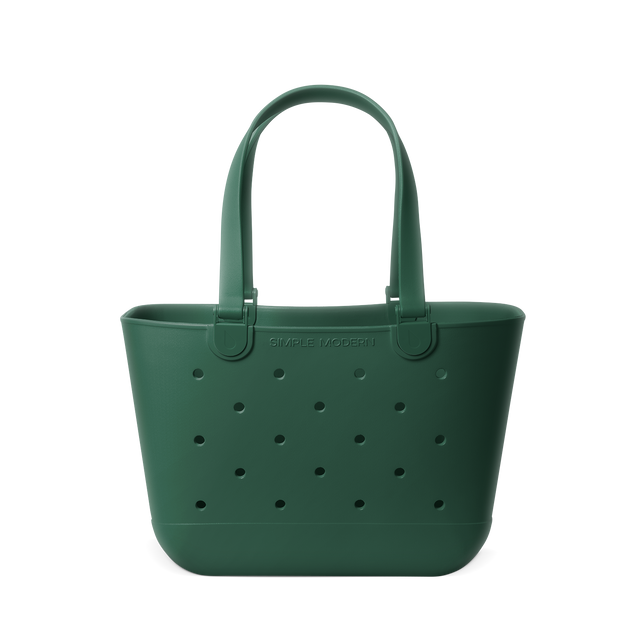 Forest green canvas tote bag with handles displayed against a white background, featuring a muted sage tone color finish. Forest green canvas tote bag with handles displayed against a white background, featuring a muted sage tone color finish.