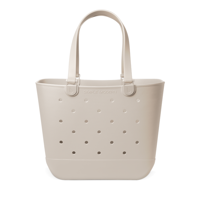 Soft beige cream-colored large tote bag on white background, minimalist design with neutral warm tone aesthetic Soft beige cream-colored large tote bag on white background, minimalist design with neutral warm tone aesthetic