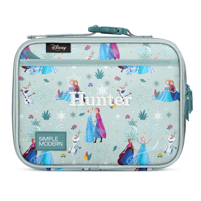 Simple Modern Frozen lunch box in mint green with Elsa, Anna, and Olaf characters, snowflakes, and ice palace design. Features teal handle, zippered top, and Simple Modern Frozen lunch box in mint green with Elsa, Anna, and Olaf characters, snowflakes, and ice palace design. Features teal handle, zippered top, and