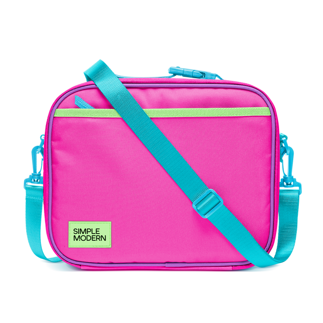Hot pink insulated lunch bag with turquoise blue zippers, side handles, and adjustable shoulder strap for carrying meals and beverages Hot pink insulated lunch bag with turquoise blue zippers, side handles, and adjustable shoulder strap for carrying meals and beverages