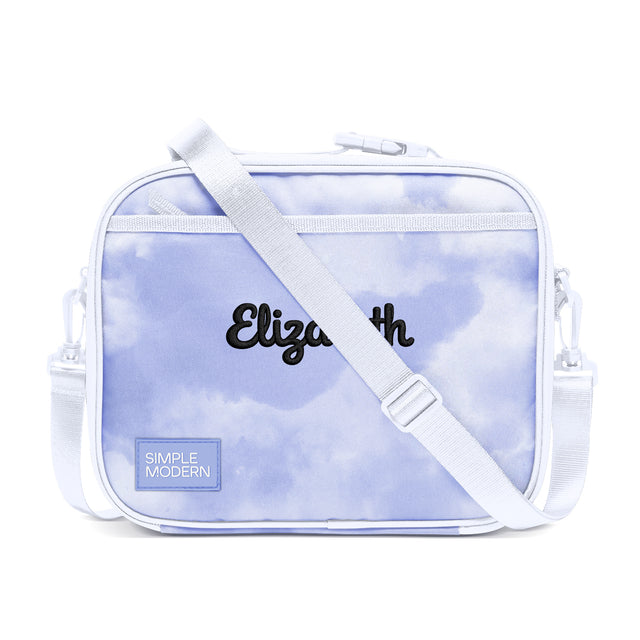 Periwinkle and white personalized lunch bag with cloud print pattern, white shoulder strap, side handles, and Periwinkle and white personalized lunch bag with cloud print pattern, white shoulder strap, side handles, and