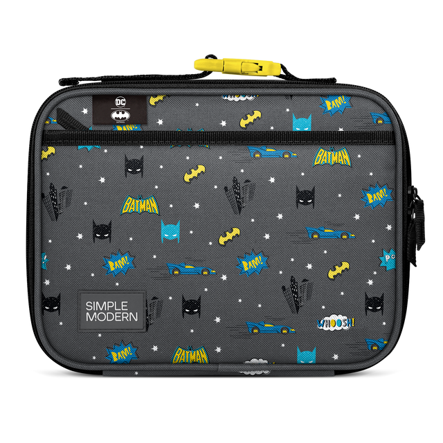 Dark charcoal gray lunch container with bright yellow, electric blue, and white accent design details Dark charcoal gray lunch container with bright yellow, electric blue, and white accent design details