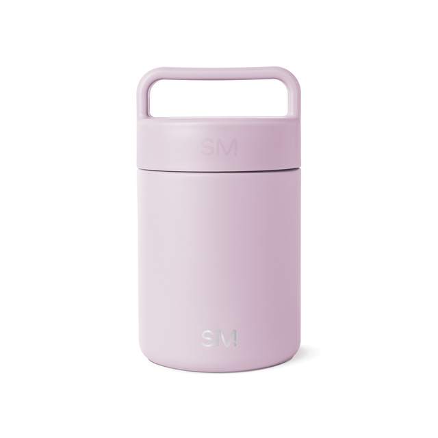 Soft lavender-pink cylindrical container with matte finish and rounded edges on white background Soft lavender-pink cylindrical container with matte finish and rounded edges on white background