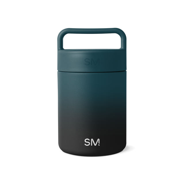 Simple Modern cylindrical insulated beverage container with two-tone color gradient design against white background Simple Modern cylindrical insulated beverage container with two-tone color gradient design against white background