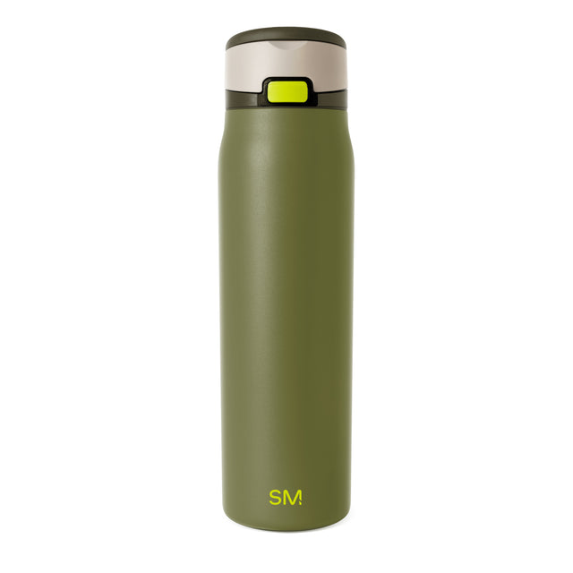 Sage green cylindrical product with cream-colored upper section Sage green cylindrical product with cream-colored upper section