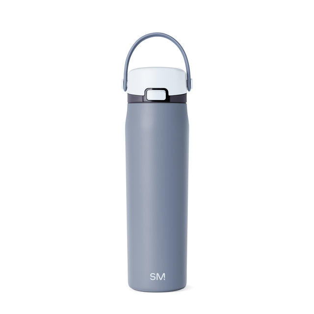 Soft slate blue insulated water bottle with white lid and cap, featuring a sleek cylindrical design for hydration and temperature retention Soft slate blue insulated water bottle with white lid and cap, featuring a sleek cylindrical design for hydration and temperature retention