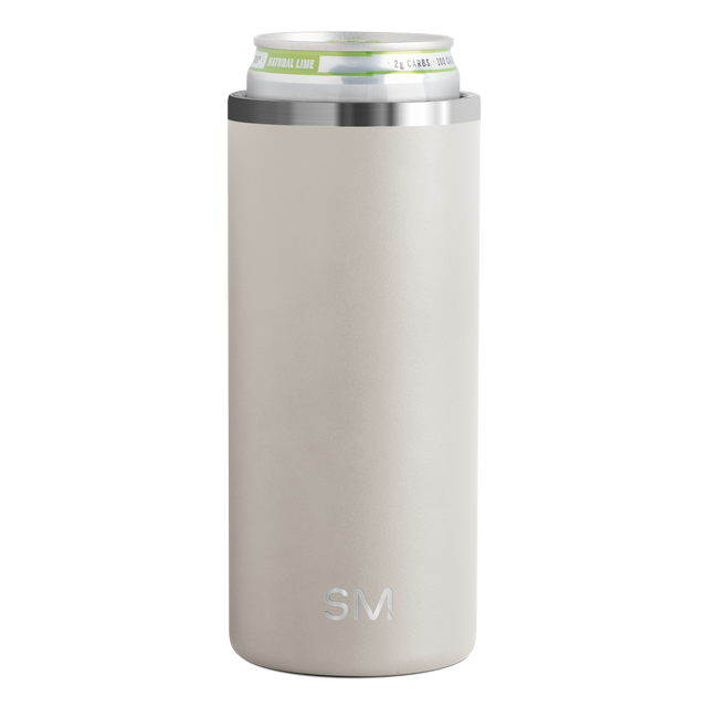 Beige and cream colored long sleeve with stainless steel silver metallic accents on upper band Beige and cream colored long sleeve with stainless steel silver metallic accents on upper band