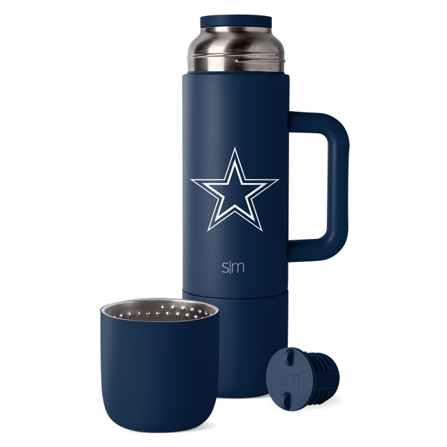 Navy blue insulated travel mug with stainless steel silver removable lid and interior cup components Navy blue insulated travel mug with stainless steel silver removable lid and interior cup components