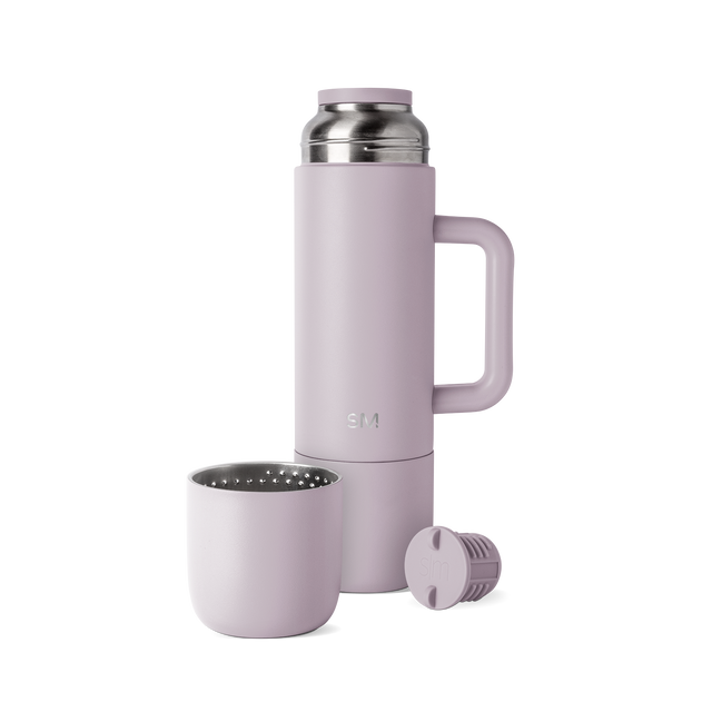 Mauve drinkware set with brushed stainless steel accents, featuring soft purple-pink tones on exterior surfaces. Mauve drinkware set with brushed stainless steel accents, featuring soft purple-pink tones on exterior surfaces.