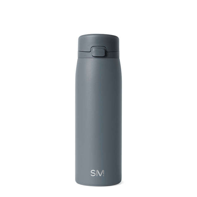 Slate gray water bottle with matching gray cap and spout mechanism, featuring a muted storm gray finish for a sophisticated neutral aesthetic. Slate gray water bottle with matching gray cap and spout mechanism, featuring a muted storm gray finish for a sophisticated neutral aesthetic.