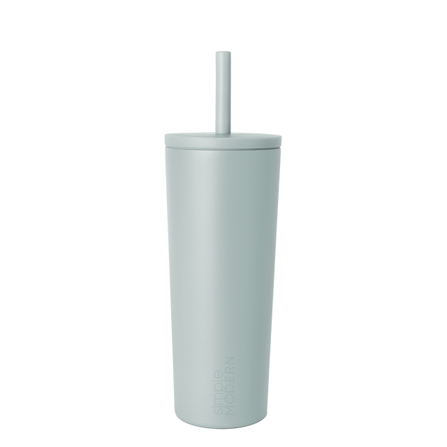 Sage green tumbler with matching straw on white background Sage green tumbler with matching straw on white background