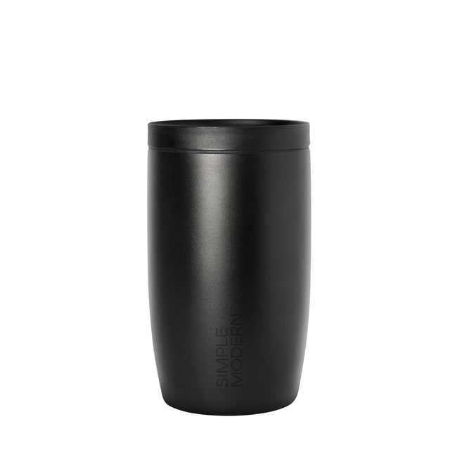 Matte black cylindrical vessel with charcoal finish and subtle light reflections showing textured surface detail Matte black cylindrical vessel with charcoal finish and subtle light reflections showing textured surface detail