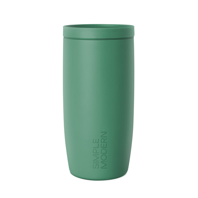 Sage green insulated tumbler with lid on white background Sage green insulated tumbler with lid on white background