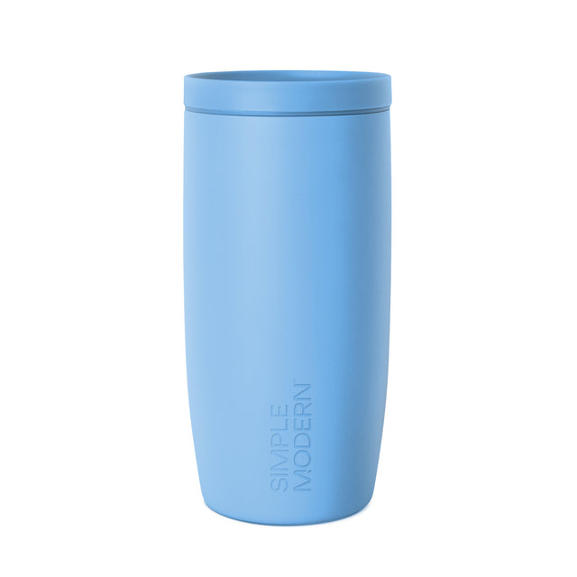 Soft medium blue tumbler with calm periwinkle tone, displayed against a neutral background. Clean, minimalist product photography suitable for drinkware e-commerce catalog. Soft medium blue tumbler with calm periwinkle tone, displayed against a neutral background. Clean, minimalist product photography suitable for drinkware e-commerce catalog.
