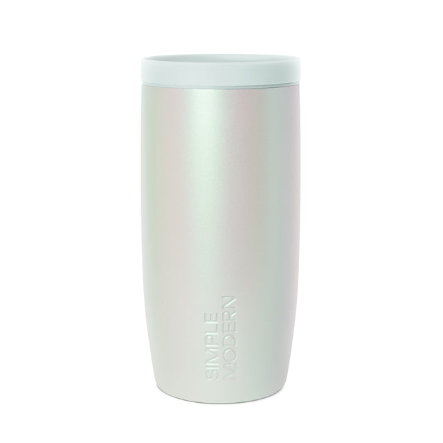 Pale mint green drinkware with iridescent sheen and subtle gradient from seafoam to off-white, creating a luminous pearlescent finish. Pale mint green drinkware with iridescent sheen and subtle gradient from seafoam to off-white, creating a luminous pearlescent finish.