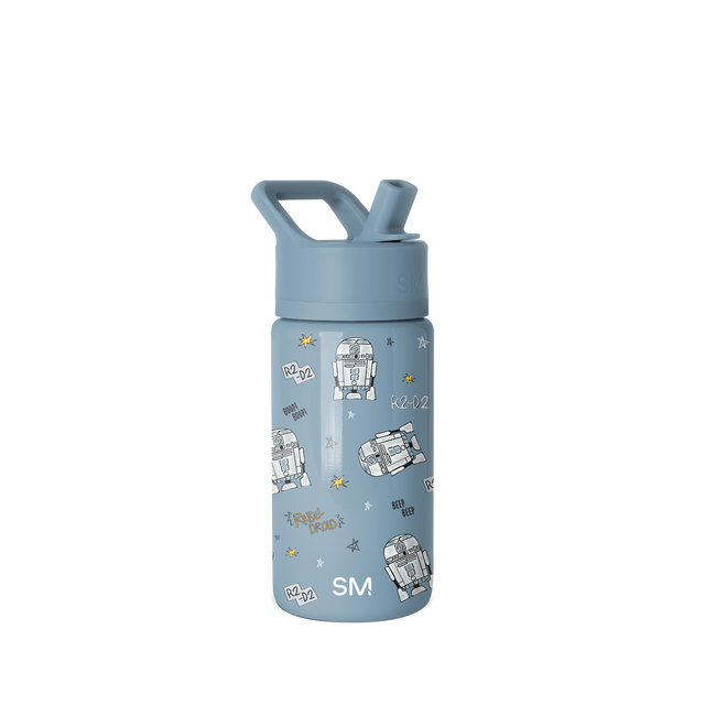 Slate blue glass bottle with white and gold accents on the label and body Slate blue glass bottle with white and gold accents on the label and body