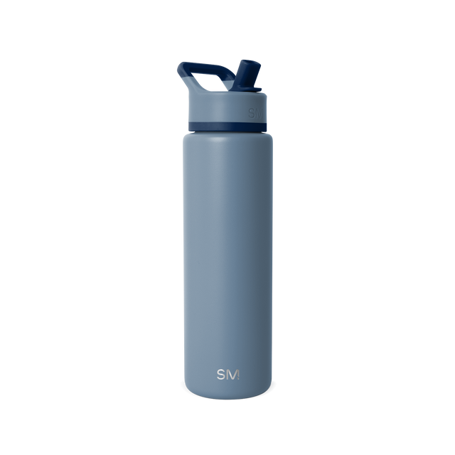 Water bottle with soft blue-gray body, navy blue lid and handle, shown against white background. Water bottle with soft blue-gray body, navy blue lid and handle, shown against white background.