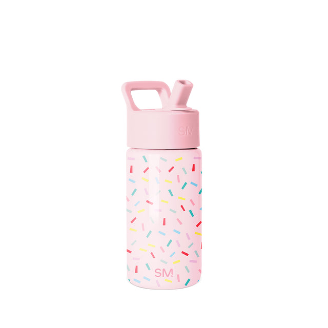Simple Modern children's water bottle with soft pink body, colorful confetti pattern, screw-on cap with SM logo, pop-up straw spout, and carry handle on white background. Simple Modern children's water bottle with soft pink body, colorful confetti pattern, screw-on cap with SM logo, pop-up straw spout, and carry handle on white background.