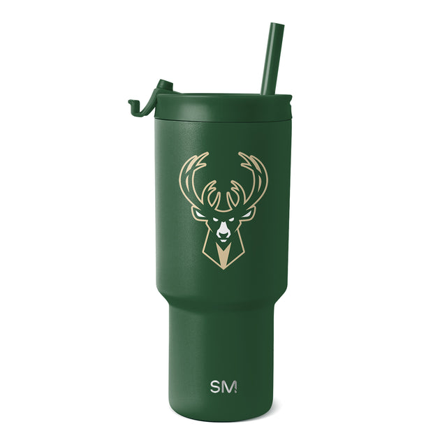 Forest green matte tumbler with tan and cream logo and branding text on white background Forest green matte tumbler with tan and cream logo and branding text on white background