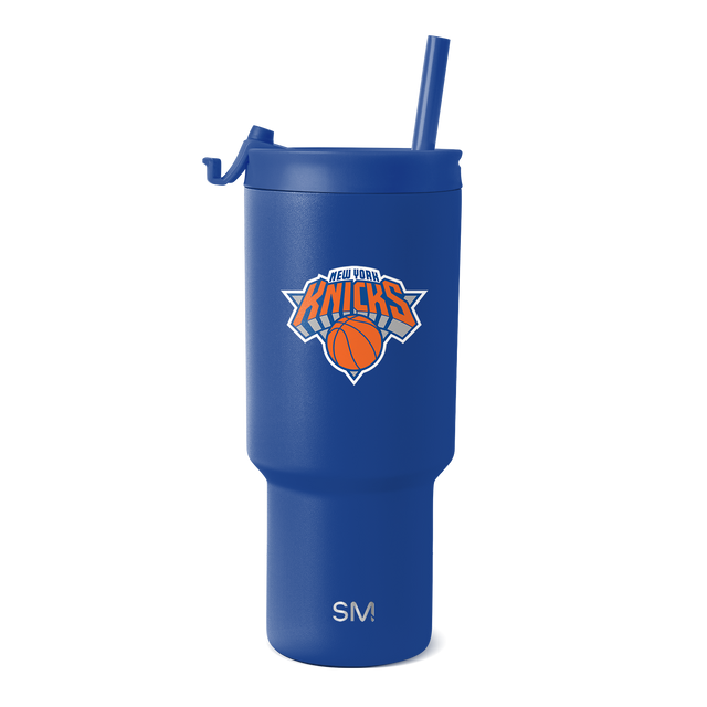 Royal blue tumbler with New York Knicks logo featuring orange and white design accents Royal blue tumbler with New York Knicks logo featuring orange and white design accents