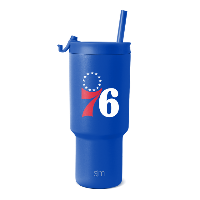 Royal blue tumbler with white text and red swoosh design element Royal blue tumbler with white text and red swoosh design element