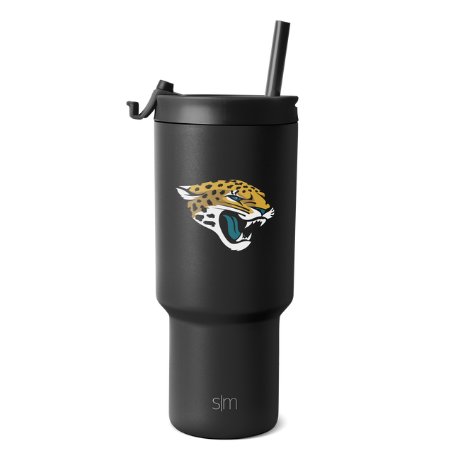 Matte black tumbler with Jacksonville Jaguars logo featuring a gold and metallic yellow jaguar head and body with white accents Matte black tumbler with Jacksonville Jaguars logo featuring a gold and metallic yellow jaguar head and body with white accents