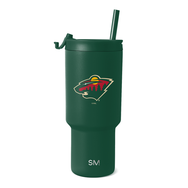 Forest green stainless steel tumbler with cream-colored branding accents Forest green stainless steel tumbler with cream-colored branding accents