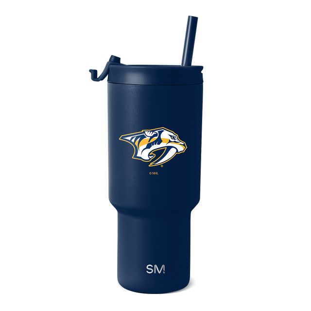 Deep navy blue insulated tumbler with navy lid and tapered base, shown against white background Deep navy blue insulated tumbler with navy lid and tapered base, shown against white background