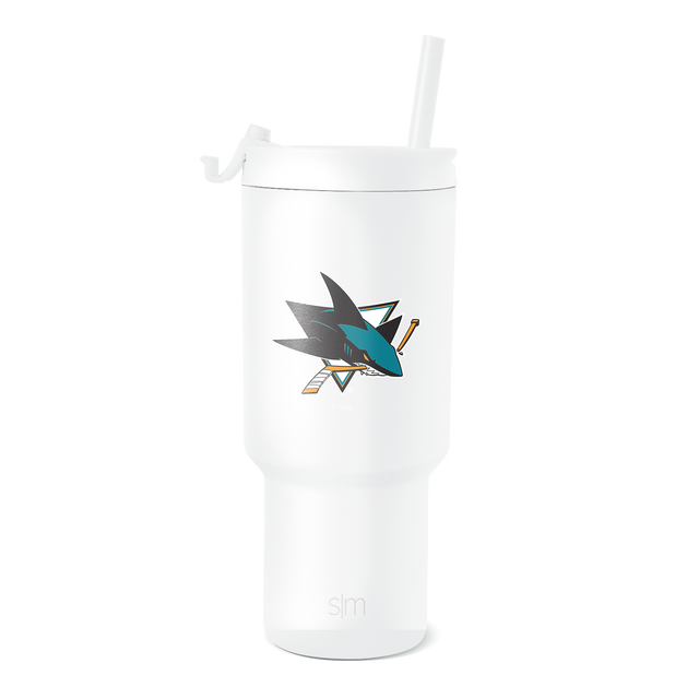 San Jose Sharks logo in teal blue, dark charcoal gray, and gold on a white tumbler with white background San Jose Sharks logo in teal blue, dark charcoal gray, and gold on a white tumbler with white background